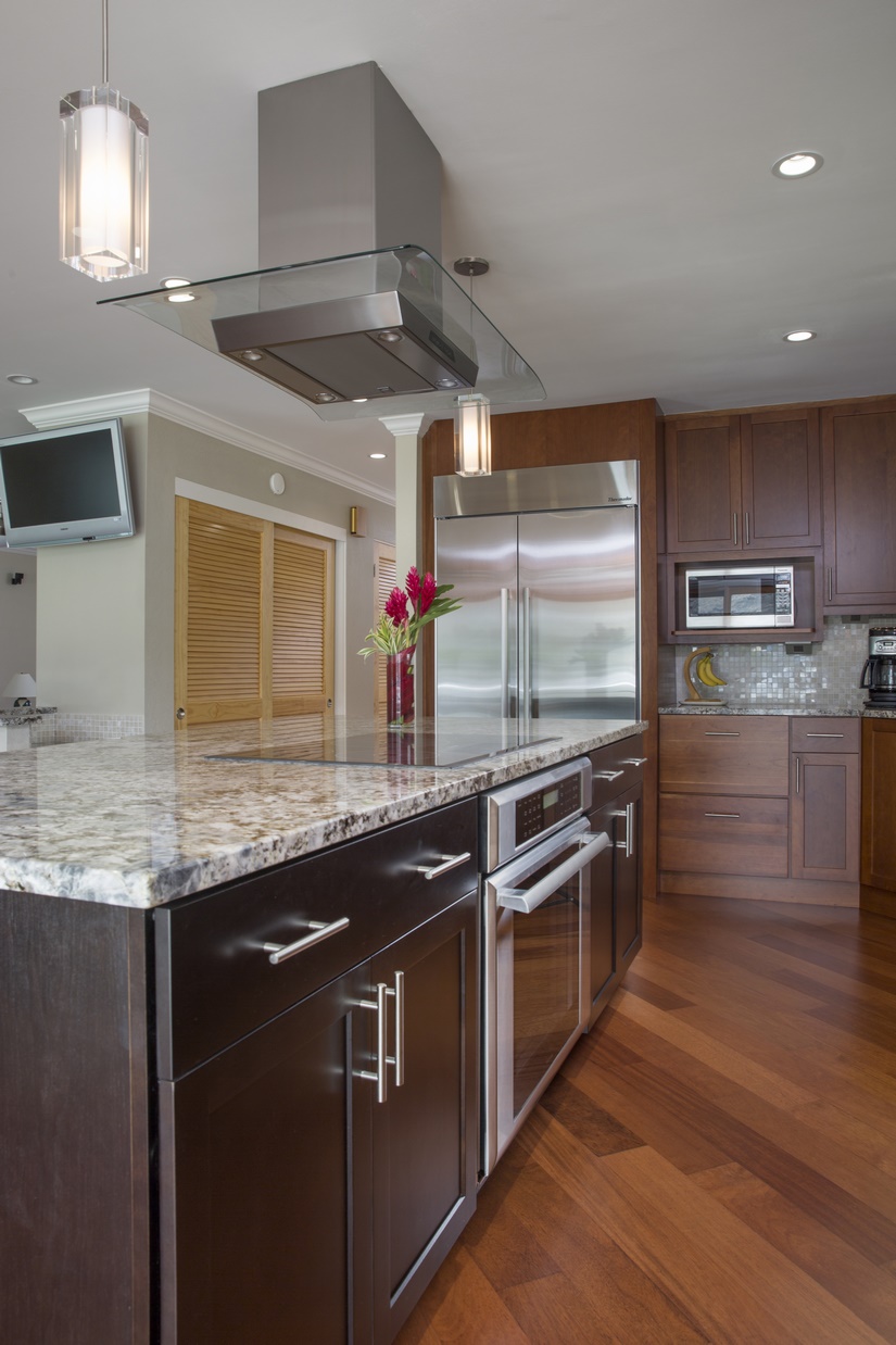 The kitchen remodel incorporated numerous lighting options, including recessed lights, under-cabinet lighting and pendant lights.